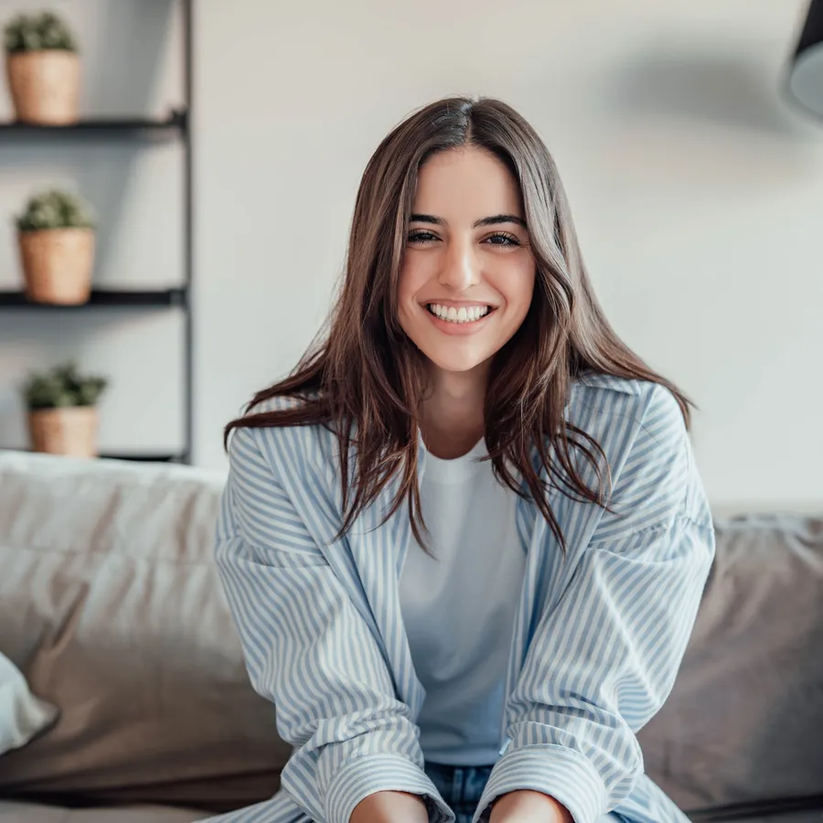 Young woman with relaxed confident smile